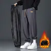 Pantalones con forro polar y engrosados para hombre, otoño e invierno, cálidos de algodón, pantalones jogger, estilo casual deportivo holgado, pantalones largos de primavera y otoño