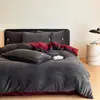 Juego de ropa de cama de cuatro piezas de terciopelo de leche de color sólido minimalista de grado A, engrosado para el calor del invierno, funda de edredón y sábana bajera de forro polar coral, disponible para compra grupal como regalo