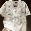 Moda Tie-Dye al por mayor transfronteriza de alta gama con cuello redondo, nuevo estilo de verano, manga corta, marca de lujo ligero de moda, camiseta holgada para hombre