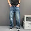 Jeans rectos casuales retro versátiles de alta calle, nueva colección de otoño, diseño de silueta lavada, pantalones de pierna curva para hombre