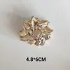 Pinza para el Cabello de Aleación con Forma de Estrella de Mar Europea y Americana para Mujer, Pinza Tiburón de Moda para Recogido Parcial, Pinza para el Cabello de Caracola, Tocado Versátil Personalizado Transfronterizo