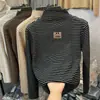 Blusa Segunda Pele de Fleece Infantil Outono Inverno 2026 Novo Estilo Blusa Listrada Infantil Casual Gola Meia-Alta Manga Longa para Camada