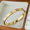Pulsera de Zirconio CNC de Alta Calidad de Venta Caliente Transfronteriza, Color Acero Oro de 18K, Pulsera de Marca Grande, Resistente al Agua, No se Cae