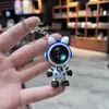 Llavero con colgante de astronauta y conejo estrellado para coche, creativo, para parejas, bolsa de regalo, regalos colgantes