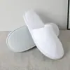 Pantuflas desechables antideslizantes engrosadas para hoteles de estrellas, pantuflas grandes de vellón de coral para casas de huéspedes, salones de belleza y hospitalidad en el hogar.