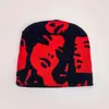 Nuevo gorro de punto con estampado facial estilo europeo y americano transfronterizo para hombre y mujer cálido nicho personalidad casual gorro de lana venta al por mayor