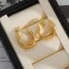Pendientes Asimétricos Retorcidos con Rayas Exageradas Transfronterizos para Mujer Pendientes Retro de Oro de 18 Quilates Pendientes de Diseño de Nicho de Alta Gama