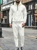 Nueva sudadera deportiva casual con capucha de gofres de color liso para hombre con media cremallera y pantalón, de Amazon, para otoño e invierno, transfronteriza