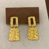 Diseño irregular hueco de flor de diseño personalizado versátil de nicho colección de pendientes redondos y cuadrados pendientes de alta gama para mujer