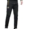Moda de Primavera y Otoño Pantalones Rectos Delgados de Seda de Hielo para Hombre Sueltos Casuales Combinan con Todo Elásticos Tallas Grandes Deportivos Rectos China