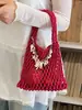 Bolso de Punto Calado de Diseño de Nicho para Mujer 2026 Nuevo Verano Estilo Coreano Versátil Bolso Tejido Hecho a Mano Bolso de Cubo de Mano