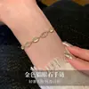 Pulsera de Ojo de Gato con Nariz de Cerdo Dorada para Mujer, Elegante y Lujosa, Diseño de Nicho con Sensación de Alta Gama, Joyería de Mano Exquisita y Versátil
