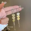 Exquisitos pendientes largos cortos con borlas incrustados de perlas y diamantes para mujer diseño de nicho de lujo ligero pendientes de lazo amor