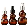 Botella de Aceite Esencial Marrón a Prueba de Luz Frasco Gotero Doble Calabaza Botella de Vidrio para Loción Cosmética Sub-Botella de Vidrio Mayoreo