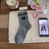 Calcetines de algodón para mujer de primavera y otoño con lazos, estilo coreano, ribete de encaje, longitud media, bloques de color, encaje, adecuados para combinar con zapatos pequeños de cuero, calcetines superpuestos