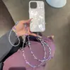 Verano Lujo Ligero Morado Láser Colorido Cuentas Heidi Cadena para Teléfono Móvil Colgante de Muñeca Portátil Anti-pérdida Cadena para Funda de Teléfono Móvil Creativa