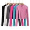 Camiseta de manga larga de fitness de yoga europea y americana para mujer, otoño e invierno 2023, top ajustado con cuello alto y botones para chica americana