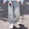 Conjunto de Duas Peças Tendência Zhongda Primavera e Outono 2026 Novo Estilo College com Blusa de Manga Longa com Pingente Hello Kitty e Jeans