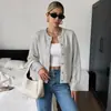 Bai Fen Zhi YiTEMU Transfronterizo 2026 Nuevo Estilo Perezoso Simple Cardigan de Punto de Color Mixto Cuello Redondo Mujer