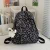 Nova mochila feminina estilosa, doce e artística, fofa, mochila de viagem leve para estudantes do ensino fundamental