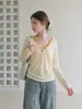 Cárdigan fino y holgado de color amarillo cremoso con botones y cuello en V para mujer, protección solar, top holgado y casual de manga larga para otoño-verano 2026