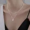 Colar de Pérolas Levemente Luxuoso para Mulheres, Versátil e Elegante, Corrente para Clavícula com Design de Nicho, Nova Corrente de Pescoço Retrô 2025