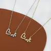 Corrente de clavícula elegante banhada a ouro real com micro cravação de zircônia, design de nicho feminino, colar de laço de amor, colar versátil