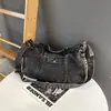 Bolso de hombro nuevo de gran capacidad 2026, versátil para el trabajo, adecuado para que los estudiantes lo usen en clase, bolso vaquero retro estilo coreano para mujer