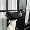 Popular bolsa de hombro de nicho para mujer 2026 nueva elegante versátil bandolera color liso moda bolso de hombro