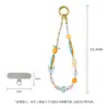 Cadena original de diseño nuevo para teléfono móvil con cuentas, resina, cristal y detalles naranjas, moderna, de nicho, alto valor estético, correa anti-pérdida para teléfono móvil para mujer