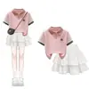 Camiseta de Manga Corta con Cuello Polo de Bloques de Color a la Moda para Niñas Verano Nuevo Estilo Dulce y Lindo Conjunto de Falda con Lazo