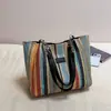 Bolsa de mano de gran capacidad, bolsa de paja para vacaciones, nueva bolsa de hombro de nicho para el día a día, moderna bolsa de playa de verano para mujer