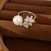 Aretes y anillo de gota de agua de perla con circonia chapados en oro real de 18k, conjunto de joyería de nicho de alta gama, exquisito y elegante