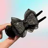 Novo grampo de cabelo com laço de strass e cabeça de bola, acessório de alta qualidade para coque de cabelo feminino, clip de cabelo da moda para redes sociais, adorno de cabeça