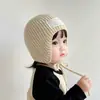 Gorro de lana tejido con protección para los oídos para niños y bebés, transfronterizo, con etiqueta de tela elegante, correas de colores caramelo para niños y niñas