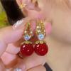 Pendientes de moda con hebilla de oreja de cuentas moradas, nuevos de 2024, diseño moderno de nicho, de alta calidad.