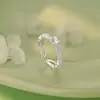 Anillo de encaje con corazón hueco estilo coreano, nuevo accesorio versátil estilo coreano con un tacto de alta gama, elegante y exquisito, disponible para venta al por mayor
