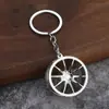 Chaveiro de cubo de roda de carro modificado mais vendido transfronteiriço, redondo, decoração de cubo de roda criativa da Amazon, pingente
