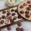 Nuevos accesorios de colgante transparente de cristal para caja binaural de flor de caucho natural