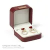 Caixa de joias premium com cantos arredondados e logotipo dourado