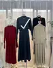 Traje de Punto Retro Francés para Mujer 2026 Primavera Nuevo Estilo Suéter de Manga Larga de Cuello Medio y Falda Elegante Conjunto de Dos Piezas