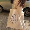 Estilo ins coreano Mismo estilo que el sitio web oficial Bolso de tela de algodón fina Versátil Casual Bolso de hombro con estampado abstracto Bolsa de compras ecológica