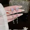 Pendientes de Borla de Mariposa Super Hada de Moda Luz de Lujo Diseño de Nicho de Gama Alta Elegantes Versátiles Largos para Mujer