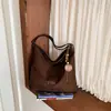 Bolsas de mano de moda transfronterizas para mujer, colección otoño 2026, con un diseño de alta gama, retro y único, incluyendo bolsos de hombro y mochilas