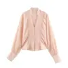 Roupas Femininas 2026 Primavera/Verão Novo Estilo Europeu e Americano Delicado Botão em V Design Decorativo Camisa Top Acinturada de Nicho
