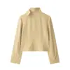 Comercio exterior transfronterizo al por mayor ropa de mujer 2026 otoño nuevo moda estilo europeo y americano color liso con decoración de bolsillo gabardina de cuello alto