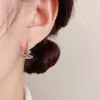 Moda Nicho Simple Metal Saturno Circonita Clip de Pendiente Pequeño Personalidad Lujo Ligero Sentido de Diseño Único Aro de Oreja Pequeño Venta al por Mayor