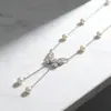 Collar Largo con Borla de Perla y Mariposa de Circonita Cúbica para Mujer, Cadena para Clavícula de Lujo Ligero de Nicho de Gama Alta, Cadena para el Cuello Elegante y Versátil