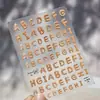 Pegatinas para Uñas con Relieve Tomoni Pegatinas para Uñas Xiaohongshu Serie de Sellos de Letras Joyería Pequeña Pegatinas para Nariz Pequeñas