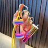 Llavero de cara sonriente de tenis con borla de cara sonriente colgante para mochila llavero de coche deportivo pequeño regalo al por mayor